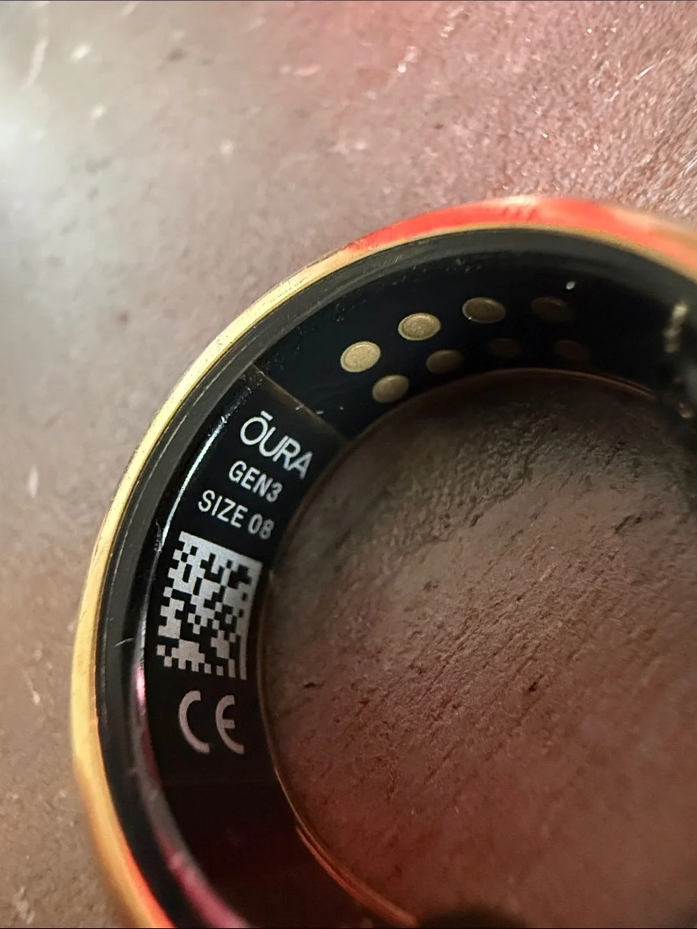 Oura Gold Tone Smart Ring with Black Charger